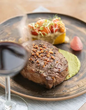  A dish of meat pairing a red malbec wine from Mendoza