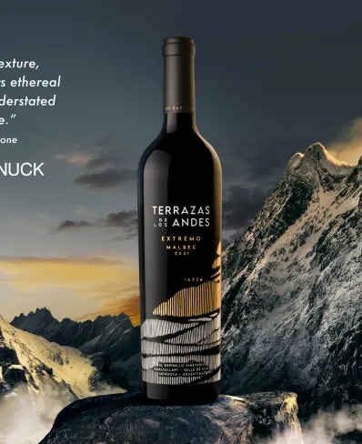 Bottle of Terrazas de los Andes Extremo Malbec 2021 high altitude red wine over the Andes mountains in Mendoza, Argentina